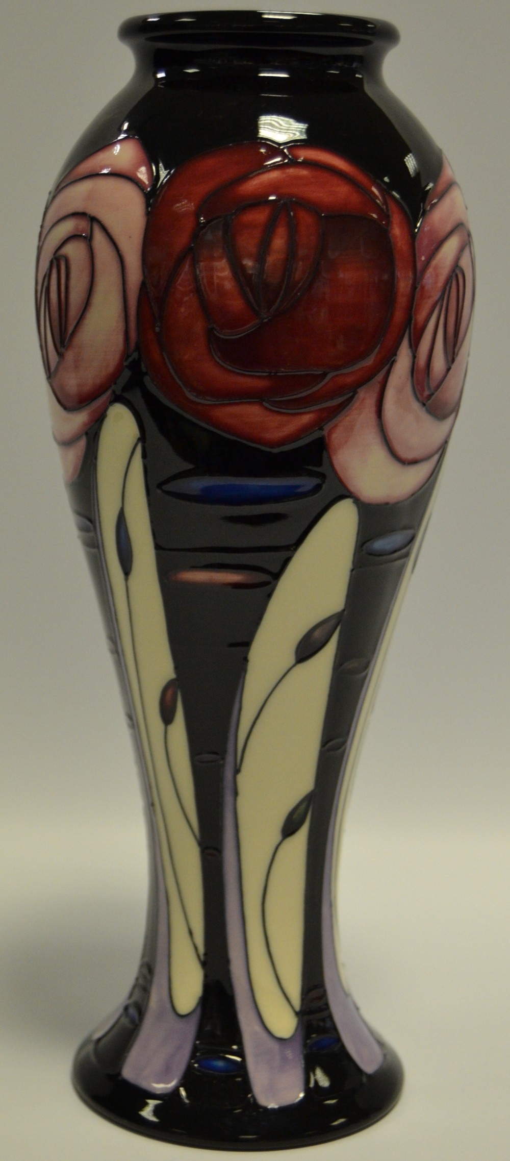 A contemporary Moorcroft Trial Rose pattern slender baluster vase,