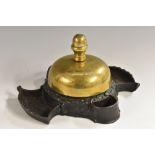 A 19th century American cast iron and brass counter bell, by Russell & Irwin Mfg. Co.