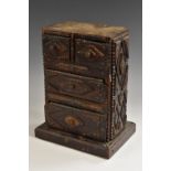 A 19th century American tramp art miniature chest of drawers,