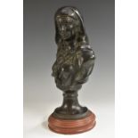 After the French School, a dark patinated bronze bust, of a maiden in Eastern dress,