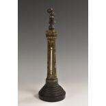 A 19th century desk thermometer, as a column, Fahrenheit scale, stepped circular ebonised base,