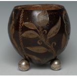 A 19th century coconut cup, sgraffito carved with Scottish thistle, English Rose,