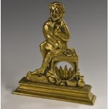 A 19th century brass novelty pocket watch stand, cast as a comical grimacing tavern dweller,