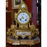 A 19th century gilt-metal mantel clock, circular dial inscribed Payne & Co, New Bond Street, London,