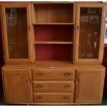 A light Ercol display cabinet,