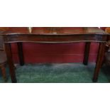 A late 18th century mahogany serving table, moulded top, serpentine front, deep frieze,