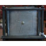 An Art Deco style mantel clock, silvered dial,