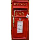 A cast metal reproduction Royal Mail post box front