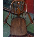 An early 20th century Ercol style armchair