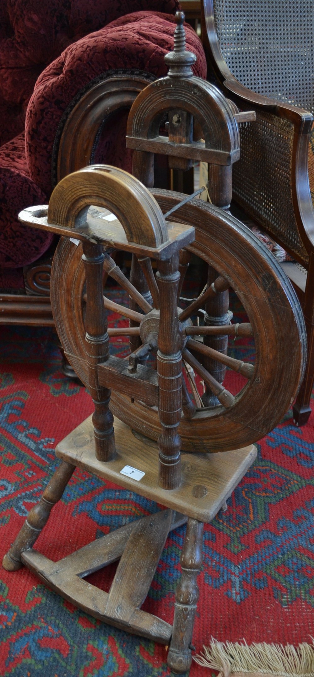 A 19th century style cottager's spinning wheel,