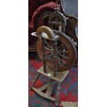 A 19th century style cottager's spinning wheel,