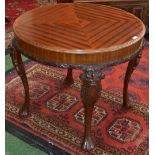 A reproduction carved mahogany quarter veneered occasional table,