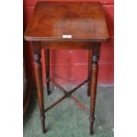 A mahogany occasional table, tapered legs, X-stretcher, 76cm high,