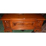 A reproduction mahogany blanket chest