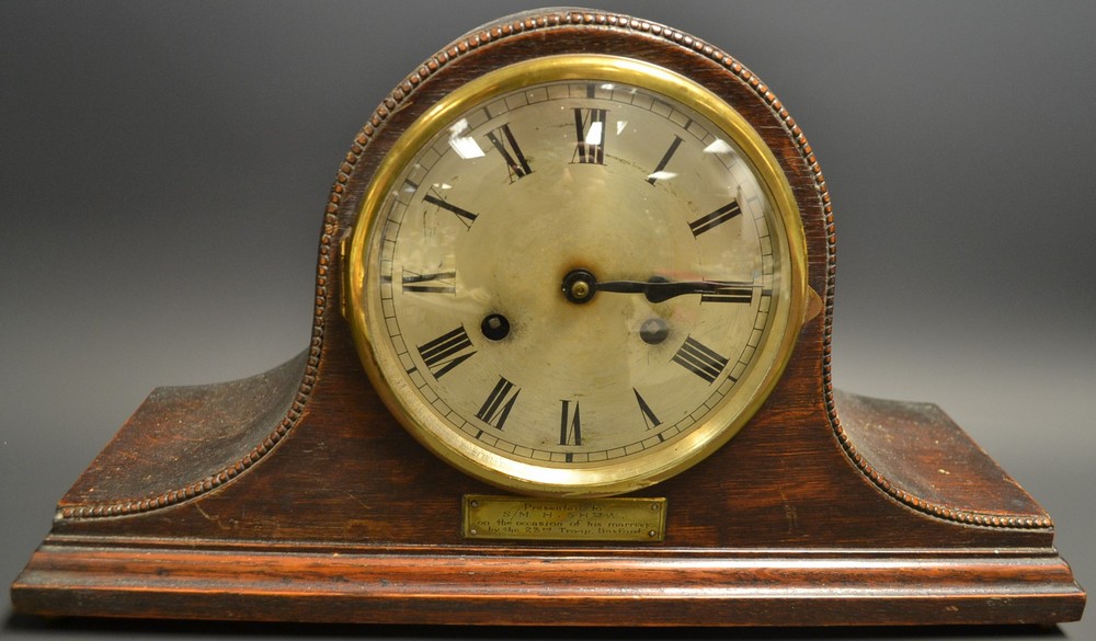 An oak mantel clock, presented by 23rd Troop,