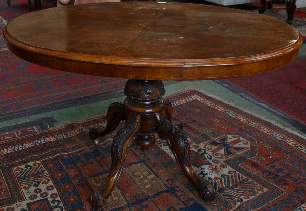 A Victorian burr walnut oval breakfast table, moulded quarter veneered top,