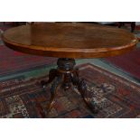 A Victorian burr walnut oval breakfast table, moulded quarter veneered top,