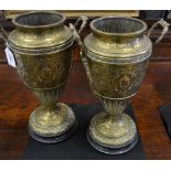 A pair of 19th century continental brass two handled urnular oil lamp bases,