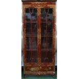 An Oriental style reproduction display cabinet,