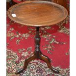 A mahogany tripod wine table, 50.5cm high, 38.