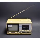 A retro portable miniature television/radio