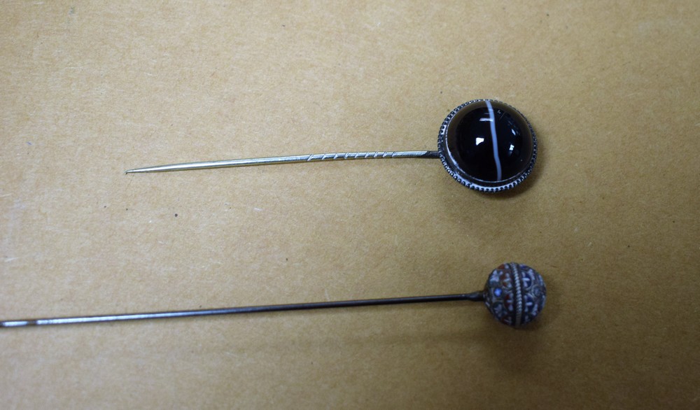 A Victorian agate set silver hat pin;