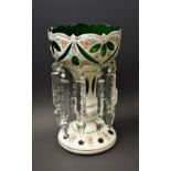 A Victorian overlaid glass lustre, green glass bowl,