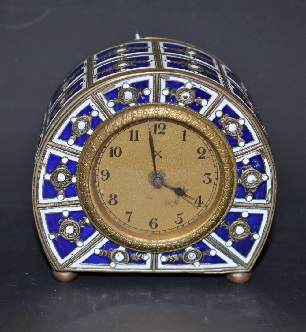 A 19th century enamel cased miniature clock