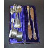 Silver - a set of six teaspoons; Mappin Brothers knives, cased; napkin rings,