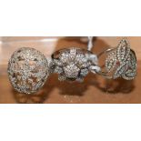 Rings - An oval open cast diamond encrusted geometric floral cluster ring; others,