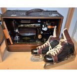 A Singer hand sewing machine,