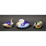 A Royal Crown Derby paperweight, Duck, gold stopper; others, Blue Tit, gold stopper; a Wren,