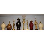 Lighting - a Chinese vasular baluster table lamp, boldly glazed in black; others similar,