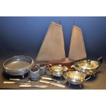 Boxes and Objects - an Art Deco pewter bowl; a three piece plated tea set;