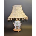 A German figural table lamp,