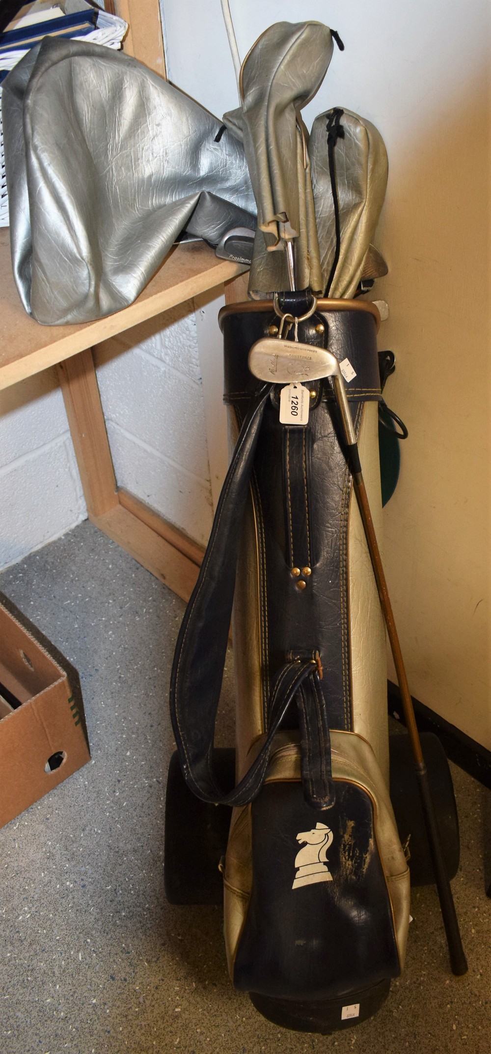 Golf Interest - a golf hand cart, bag and clubs, comprising three woods, six irons, a sand wedge,