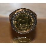 A South African 1/10 Kruggerand ring, 1982, 9ct gold shank,