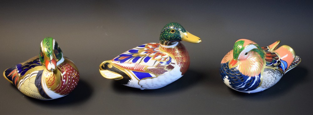 A Royal Crown Derby paperweight, Mallard, gold stopper, boxed; others, Carolina Duck, Mandarin Duck,