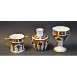 A Royal Crown Derby 1128 pattern loving cup; others, a goblet, a squat vase,
