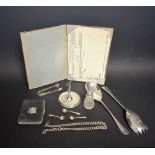 A pair of silver salad servers, Sheffield, approx 160g; a silver mounted leather telegram case,