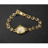 A 9ct gold Tudor Rolex lady's wristwatch, heart shaped link,