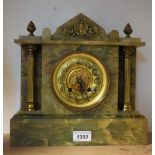 A late 19th century onyx and gilt metal mounted architectural mantel clock, 27.