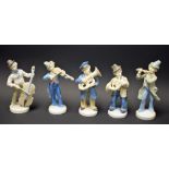 Ceramics - a Lladro style set of musicians, including violinist, bassist, horn player,