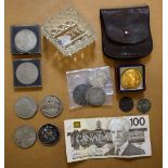 A collection of UK and foreign coins and tokens, including crowns, 1889, 1951, 1953,