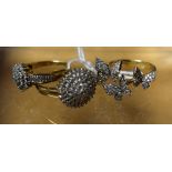 Rings - a diamond encrusted four section butterfly cluster ring; others circular,