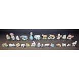 A quantity of Wade Whimsies including Huckleberry Hound, Rhino, Bear, Camel, Monkey,
