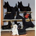 A Beswick Scottie dog, gloss black; another; other Scottie dog models including Border Fine Arts,