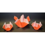 A set of three Chance Glass handkerchief vases, in orange and white, one with label,