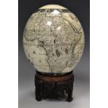 An Ostrich egg, decorated with a map of Africa,