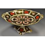 A Royal Crown Derby 1128 pattern shaped oval pedestal acorn comport, 26cm wide,